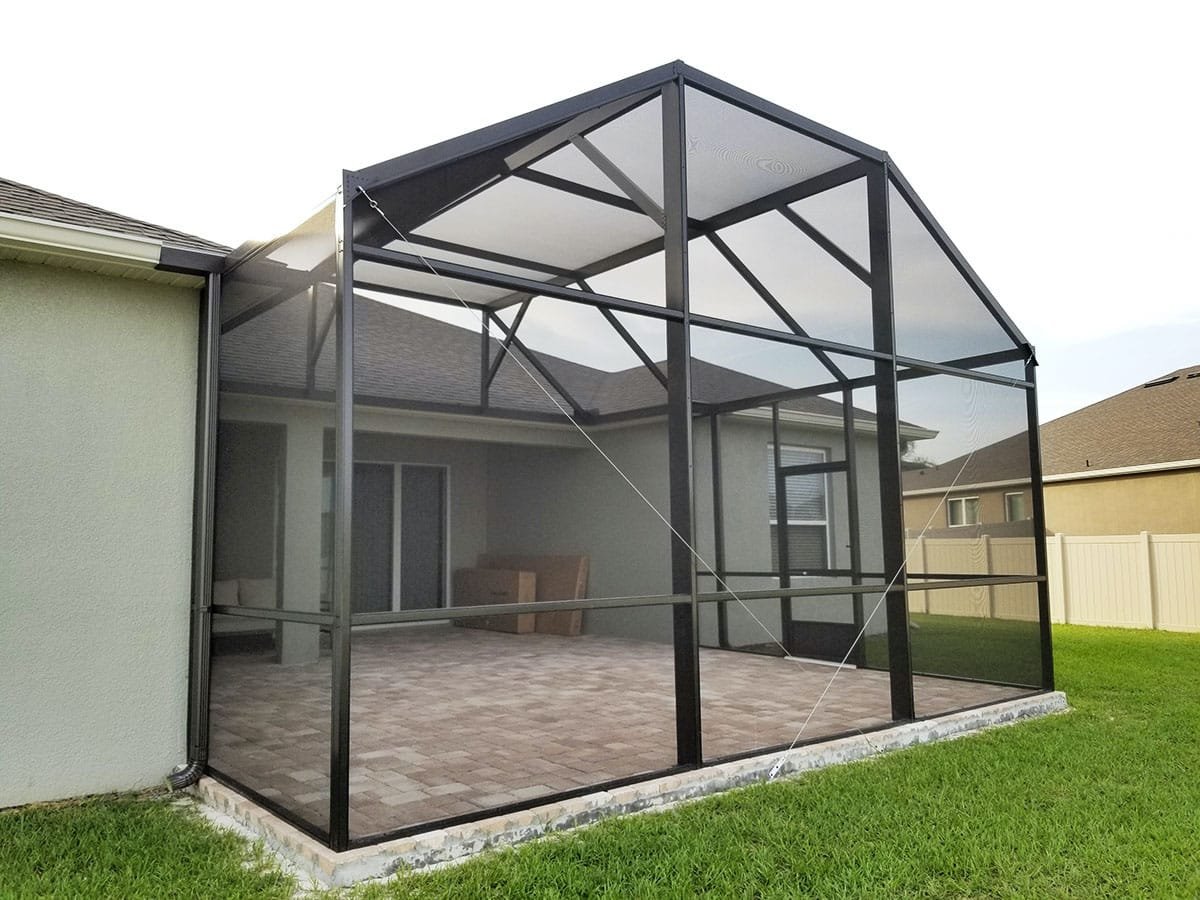 Aluminum lanai screen enclosure installation in Fort Pierce, FL residential backyard
