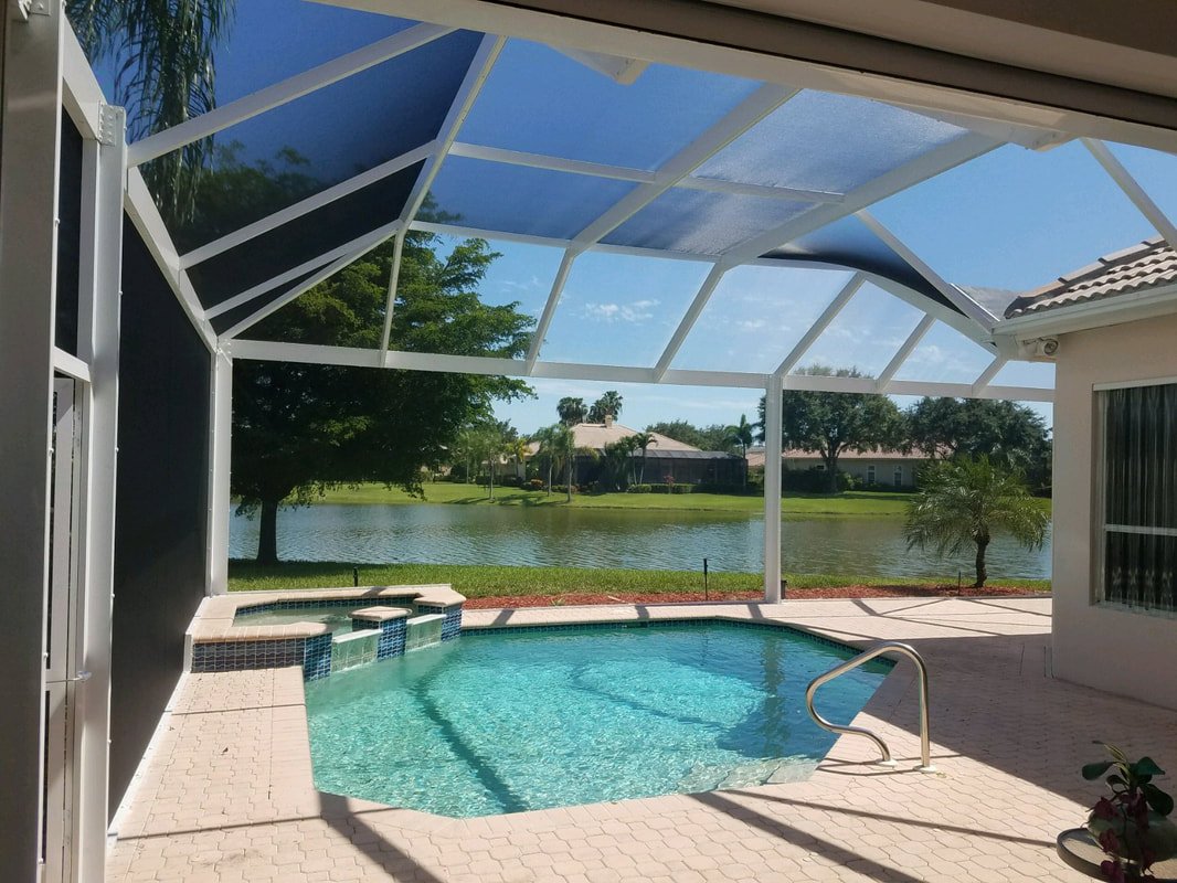 Pool enclosure rescreening in Fort Pierce, FL with waterfront residential pool area